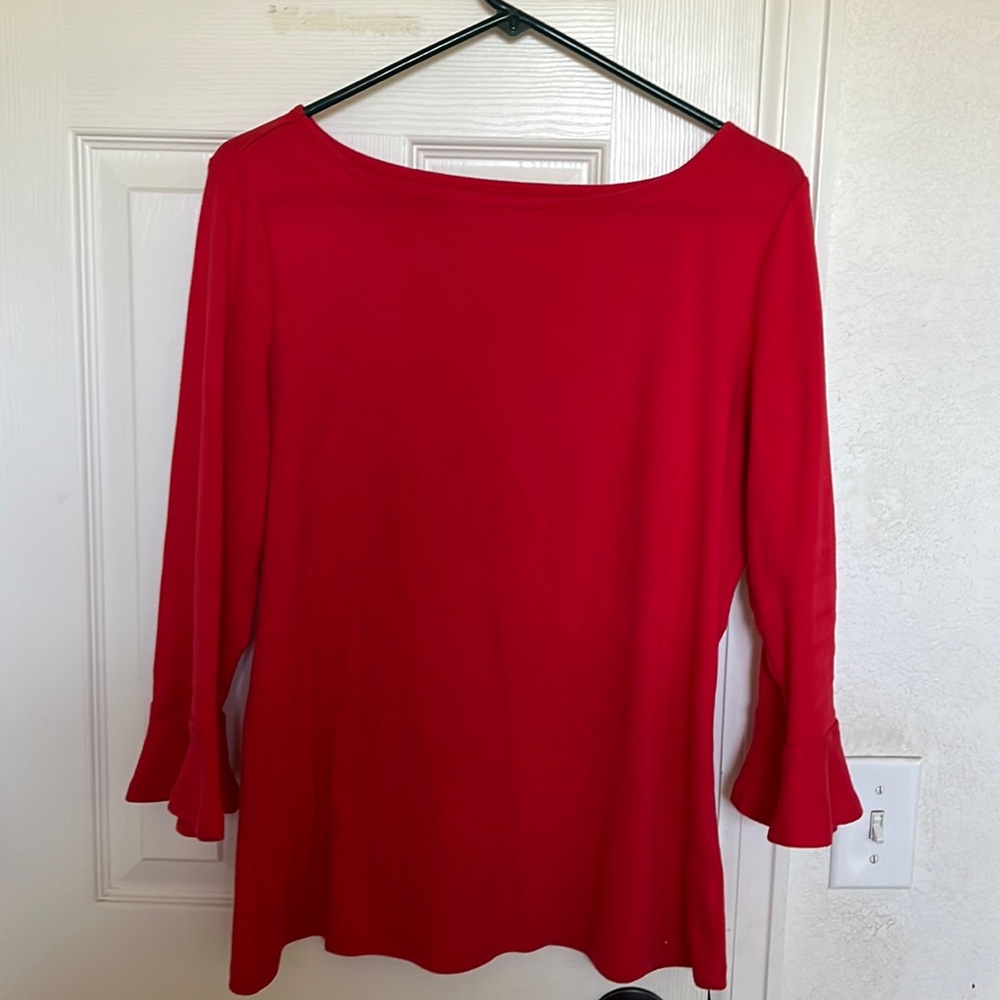 Red jersey top with 3/4 bell sleeves.